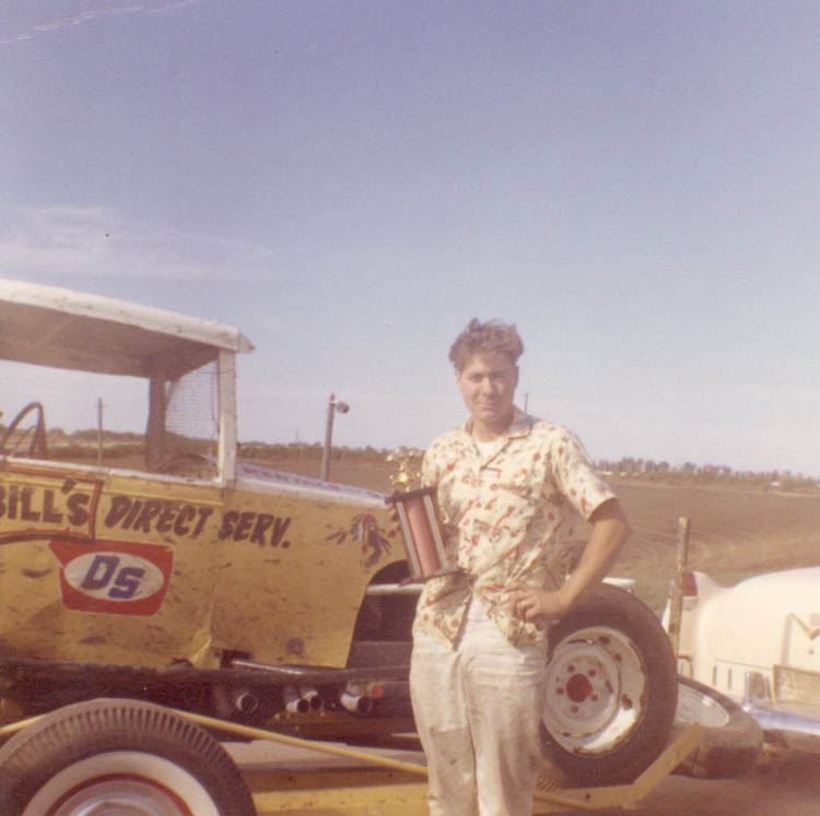 Roger_next_to_one_of_his_cars
