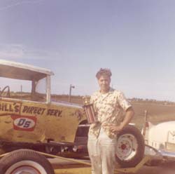 Roger_next_to_one_of_his_cars